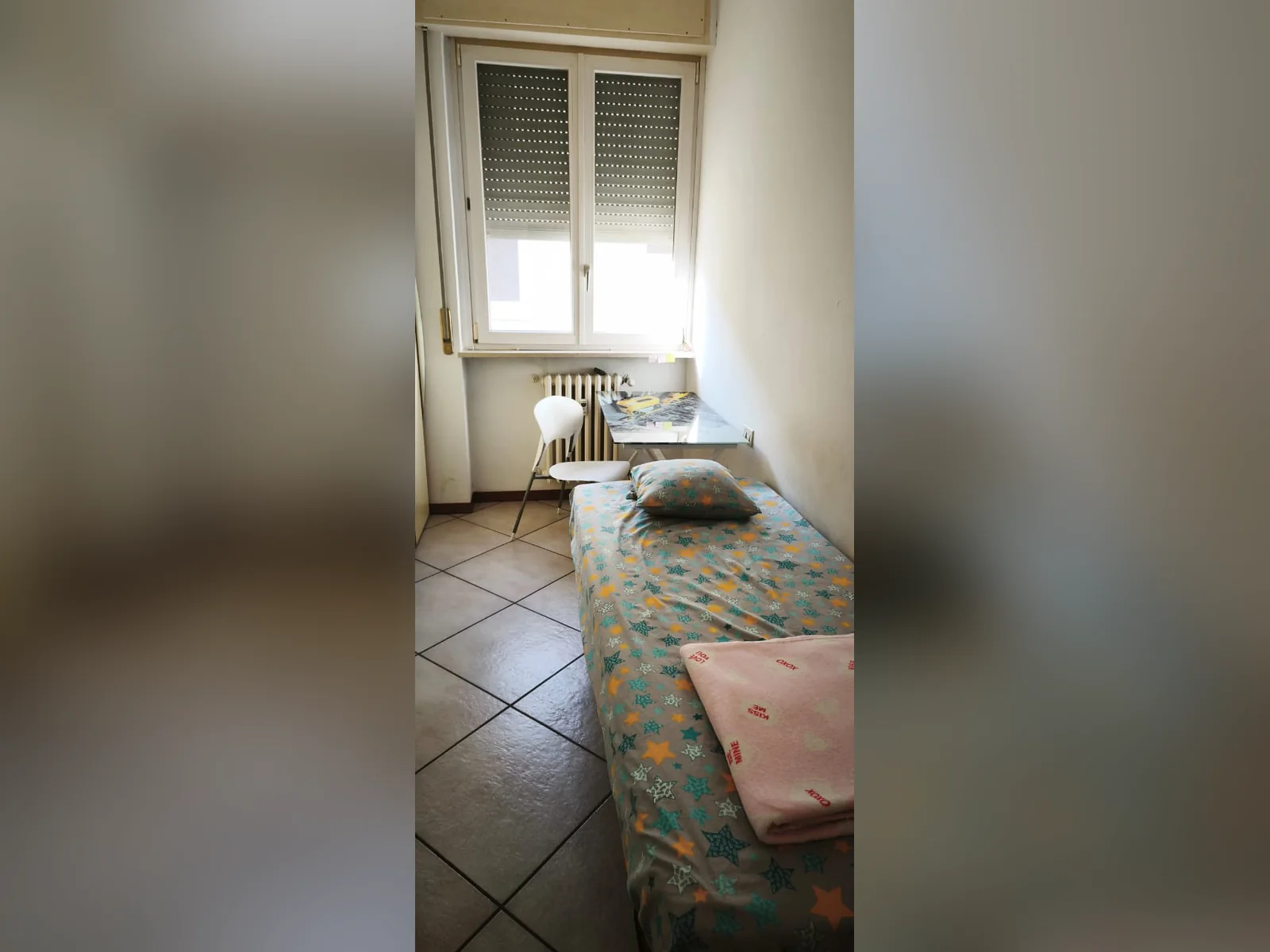 San Pietro Room 3 with its single bed, desk and bright window